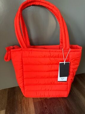 Herschel Supply Co. Retreat™ Tote in a quilted red fabric. - Sold Out Online